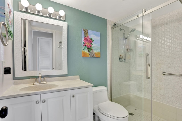 2731 NE 14th Cswy Unit 702, Pompano Beach, FL 33062 - full bathroom with a stall shower, vanity, and toilet