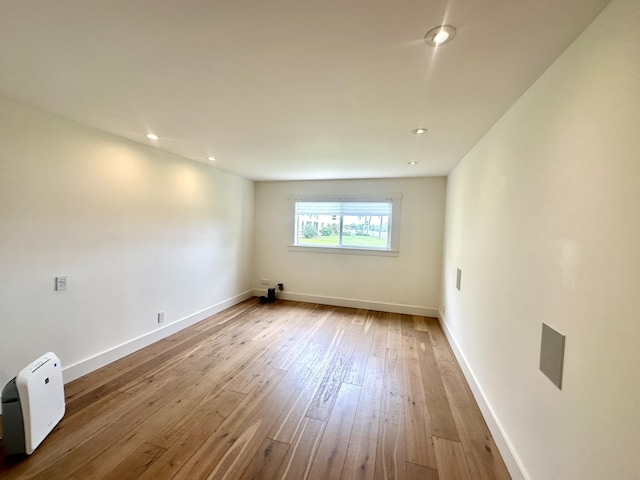 3 Colonial Club Dr Unit 104, Boynton Beach, FL 33435 - empty room with hardwood / wood-style floors, recessed lighting, and baseboards