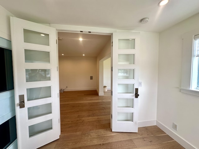 3 Colonial Club Dr Unit 104, Boynton Beach, FL 33435 - corridor with wood finished floors, recessed lighting, and baseboards