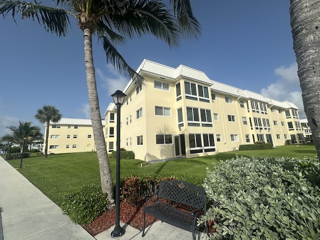 3 Colonial Club Dr Unit 104, Boynton Beach, FL 33435 - view of building exterior