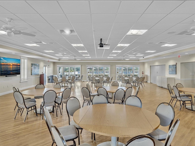 3 Colonial Club Dr Unit 104, Boynton Beach, FL 33435 - dining space with light wood finished floors, a drop ceiling, plenty of natural light, and a ceiling fan