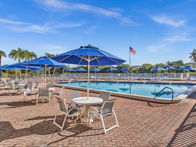 3 Colonial Club Dr Unit 104, Boynton Beach, FL 33435 - community pool with a patio area