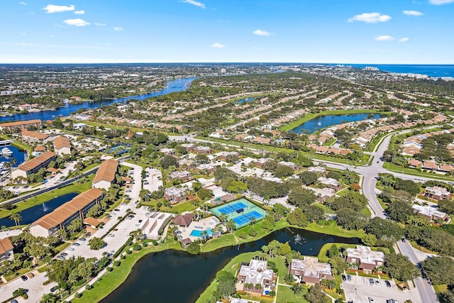 1714 17th Ct, Jupiter, FL 33477 - aerial overview of property's location featuring a large body of water and nearby suburban area