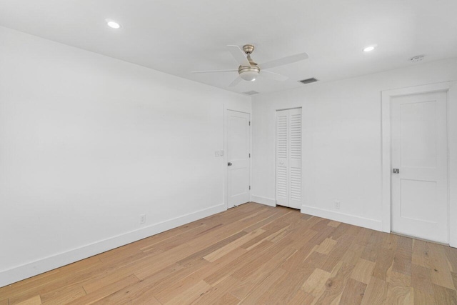 1188 W Camino Real, Boca Raton, FL 33486 - unfurnished bedroom with light wood-style flooring, baseboards, recessed lighting, ceiling fan, and a closet