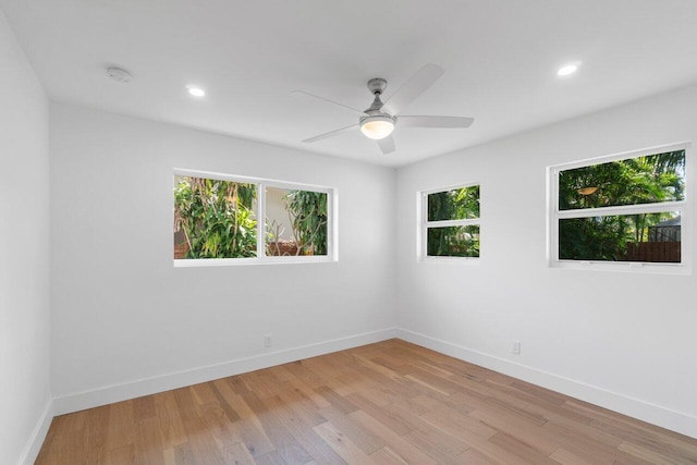 1188 W Camino Real, Boca Raton, FL 33486 - spare room with baseboards, light wood-type flooring, recessed lighting, a ceiling fan, and a smoke detector