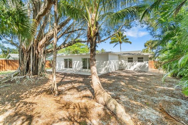 1188 W Camino Real, Boca Raton, FL 33486 - rear view of property with stucco siding