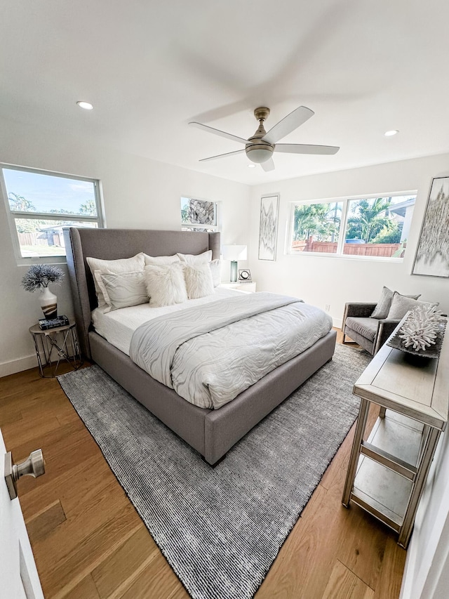 1188 W Camino Real, Boca Raton, FL 33486 - bedroom featuring ceiling fan, wood finished floors, and recessed lighting
