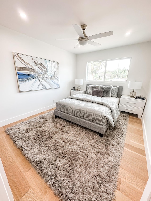 1188 W Camino Real, Boca Raton, FL 33486 - bedroom featuring wood finished floors, ceiling fan, baseboards, and recessed lighting