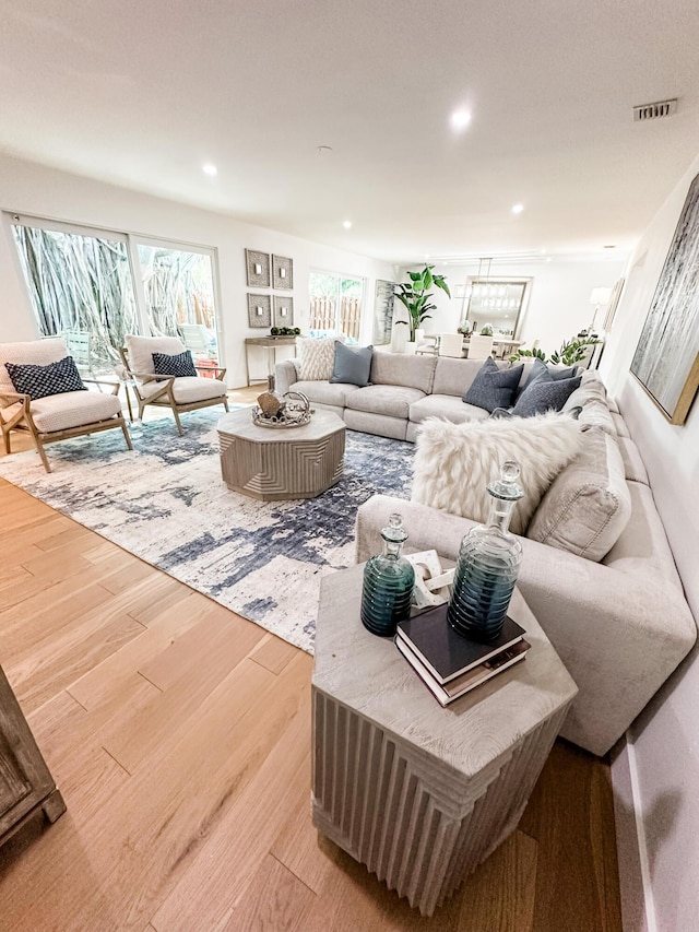 1188 W Camino Real, Boca Raton, FL 33486 - living area featuring light wood finished floors and recessed lighting