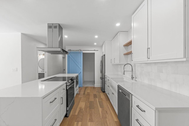 1188 W Camino Real, Boca Raton, FL 33486 - kitchen featuring stainless steel appliances, island range hood, a sink, open shelves, and light countertops