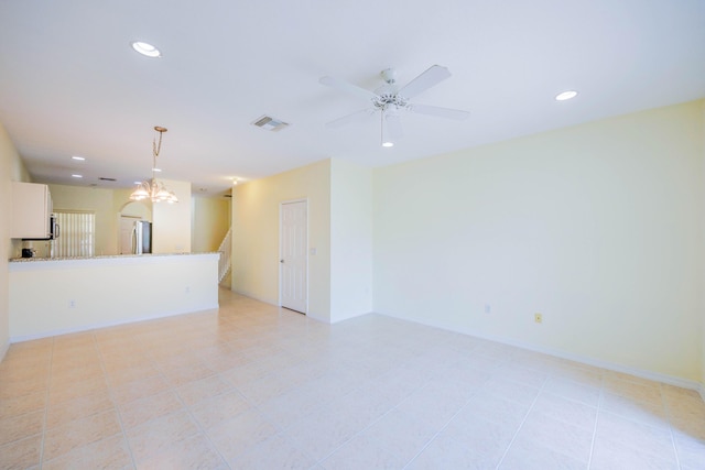 5441 Via Delray Unit 17, Delray Beach, FL 33484 - unfurnished living room with recessed lighting, ceiling fan, a chandelier, stairs, and baseboards