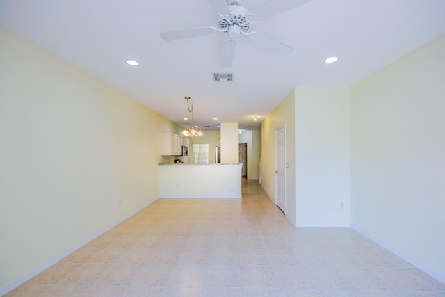 5441 Via Delray Unit 17, Delray Beach, FL 33484 - unfurnished living room featuring a chandelier, recessed lighting, light tile patterned floors, a ceiling fan, and baseboards