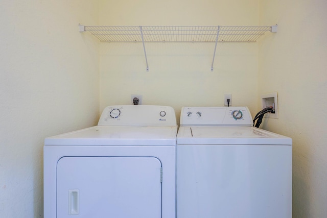 5441 Via Delray Unit 17, Delray Beach, FL 33484 - laundry area with washing machine and dryer