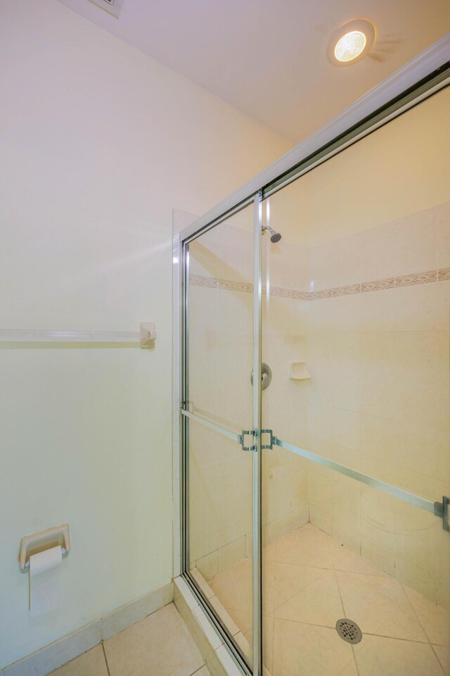 5441 Via Delray Unit 17, Delray Beach, FL 33484 - full bathroom featuring a stall shower and tile patterned floors