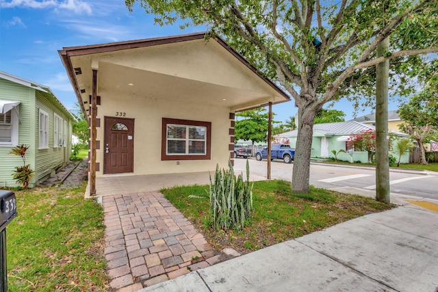 332 S E St, Lake Worth Beach, FL 33460 - shotgun-style home with stucco siding