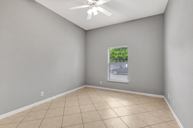 332 S E St, Lake Worth Beach, FL 33460 - spare room with a ceiling fan, light tile patterned flooring, and baseboards
