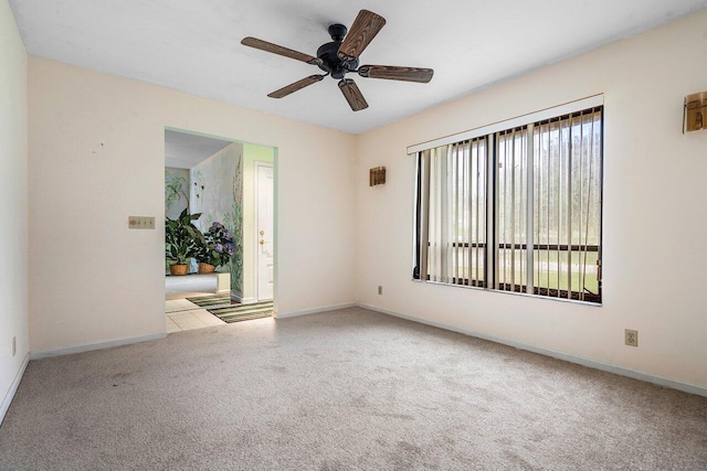 4744 Dolphin Dr, Lake Worth, FL 33463 - empty room featuring carpet floors, a ceiling fan, and baseboards