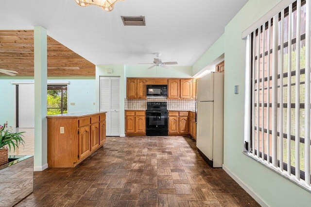 4744 Dolphin Dr, Lake Worth, FL 33463 - kitchen featuring black appliances, backsplash, light countertops, a ceiling fan, and brown cabinetry
