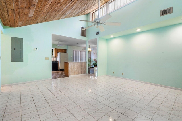4744 Dolphin Dr, Lake Worth, FL 33463 - unfurnished living room with electric panel, ceiling fan, high vaulted ceiling, baseboards, and recessed lighting