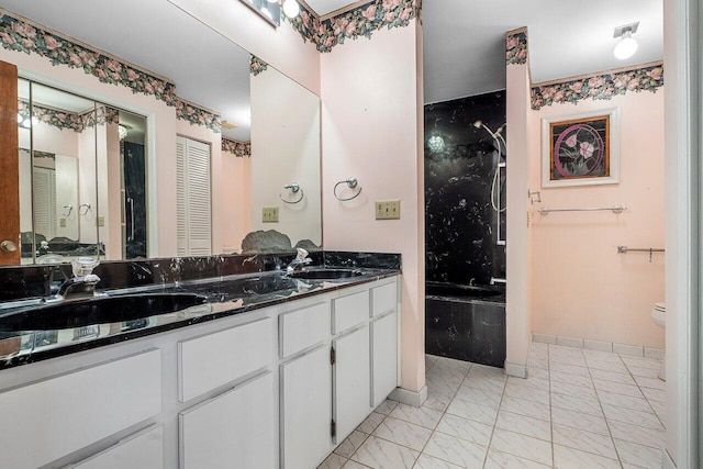 4744 Dolphin Dr, Lake Worth, FL 33463 - full bathroom with marble look tile flooring, double vanity, toilet, baseboards, and a combined bath / shower with marble appearance