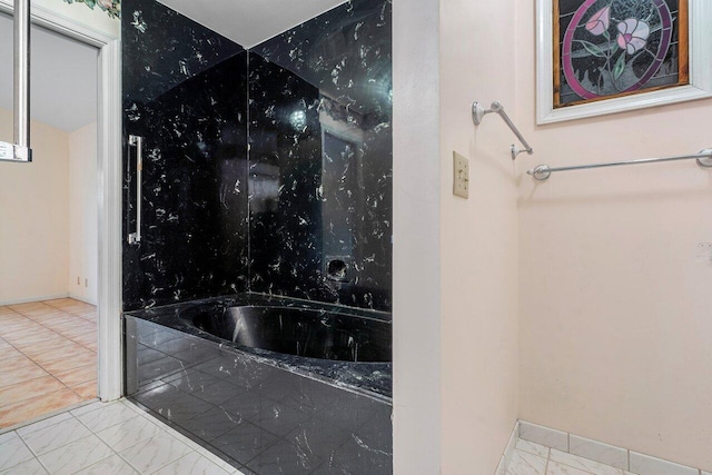 4744 Dolphin Dr, Lake Worth, FL 33463 - bathroom with marble finish floors and a tub with marble appearance