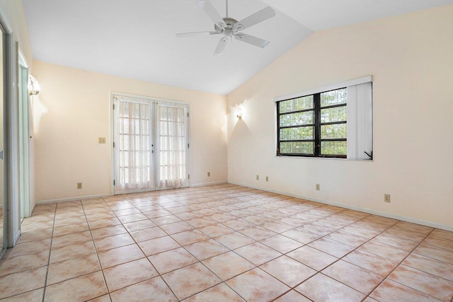 4744 Dolphin Dr, Lake Worth, FL 33463 - tiled spare room featuring vaulted ceiling, ceiling fan, and baseboards