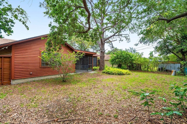 4744 Dolphin Dr, Lake Worth, FL 33463 - view of yard with a sunroom
