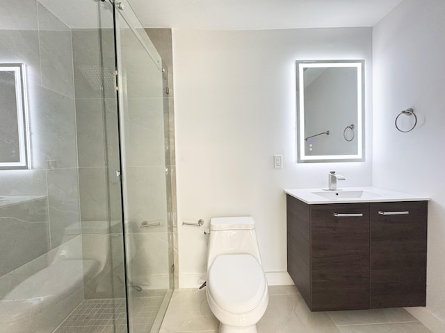 15809 85th Rd N, The Acreage, FL 33470 - bathroom with toilet, a shower stall, vanity, and tile patterned floors