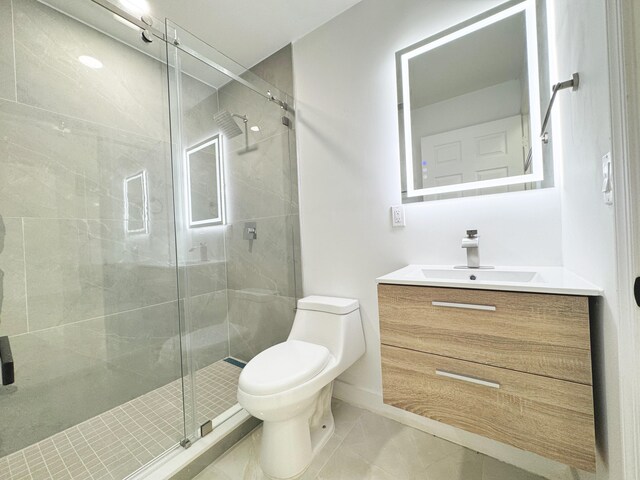 15809 85th Rd N, The Acreage, FL 33470 - bathroom featuring vanity, a stall shower, toilet, and baseboards