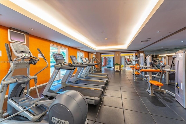 550 Okeechobee Blvd Unit 825, West Palm Beach, FL 33401 - exercise room featuring a tray ceiling