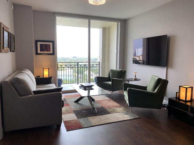 550 Okeechobee Blvd Unit 825, West Palm Beach, FL 33401 - living room with floor to ceiling windows and wood finished floors