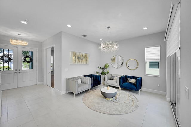 5452 Macoon Way, Westlake, FL 33470 - entryway with a chandelier, baseboards, recessed lighting, light tile patterned flooring, and french doors