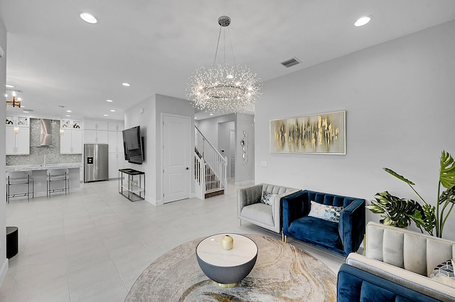 5452 Macoon Way, Westlake, FL 33470 - living room featuring a chandelier, stairway, recessed lighting, and baseboards