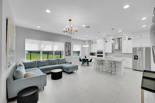 5452 Macoon Way, Westlake, FL 33470 - living area with a chandelier, recessed lighting, and light tile patterned floors