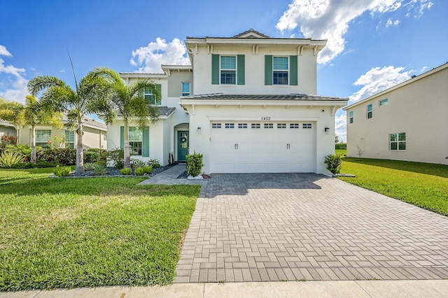 5452 Macoon Way, Westlake, FL 33470 - view of front facade featuring stucco siding, decorative driveway, a garage, and a front yard