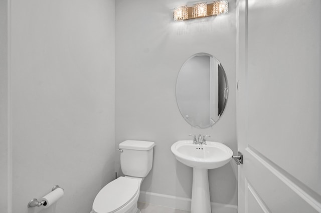 5452 Macoon Way, Westlake, FL 33470 - half bathroom with toilet, baseboards, and a sink