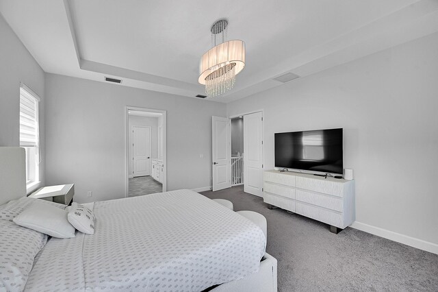 5452 Macoon Way, Westlake, FL 33470 - carpeted bedroom featuring a raised ceiling and baseboards