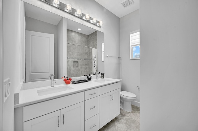 5452 Macoon Way, Westlake, FL 33470 - full bathroom with double vanity, toilet, a tile shower, and baseboards