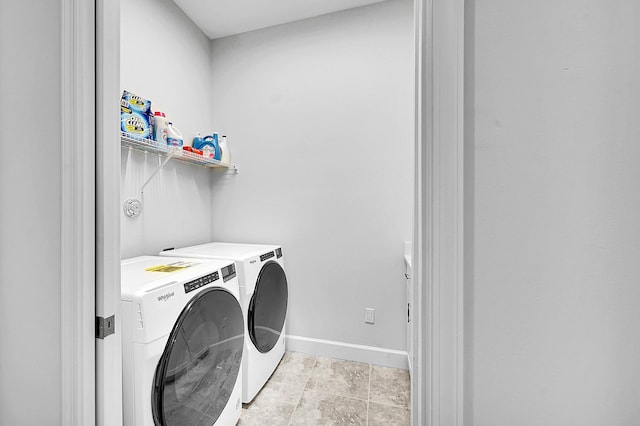 5452 Macoon Way, Westlake, FL 33470 - washroom with washing machine and dryer and baseboards