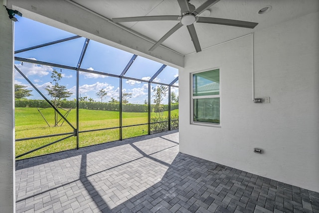 5452 Macoon Way, Westlake, FL 33470 - unfurnished sunroom featuring a ceiling fan