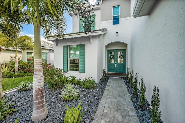 5452 Macoon Way, Westlake, FL 33470 - doorway to property featuring french doors and stucco siding