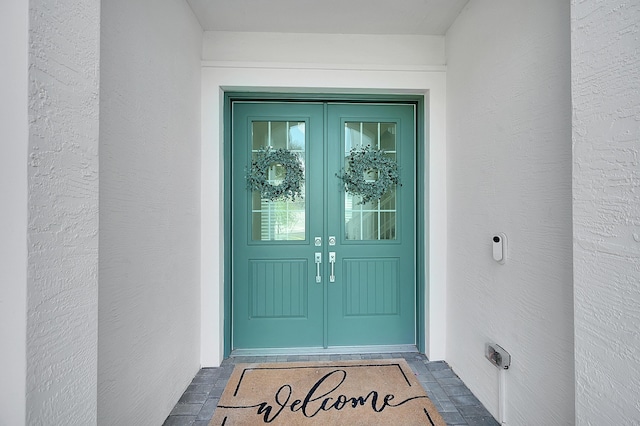 5452 Macoon Way, Westlake, FL 33470 - property entrance with french doors and stucco siding