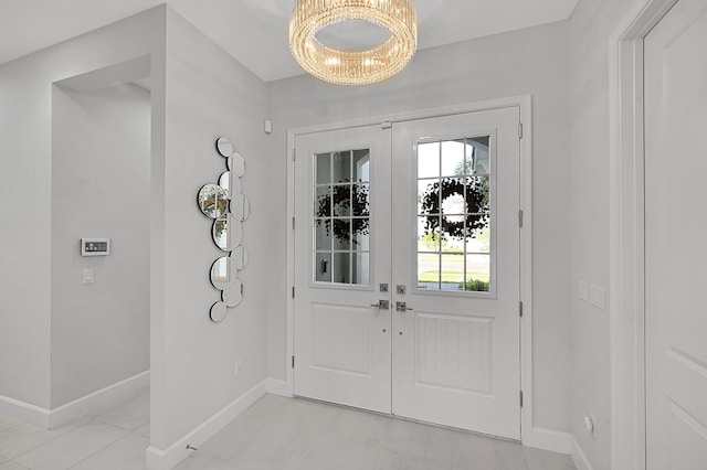 5452 Macoon Way, Westlake, FL 33470 - entrance foyer featuring a chandelier and baseboards