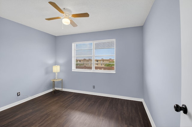 9370 SW 8th St Unit 410, Boca Raton, FL 33428 - unfurnished room featuring dark wood-style flooring, baseboards, and ceiling fan
