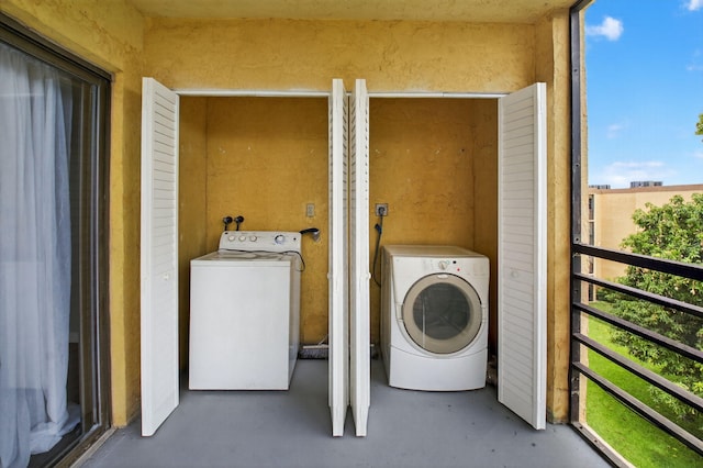 9370 SW 8th St Unit 410, Boca Raton, FL 33428 - laundry area with washer / clothes dryer