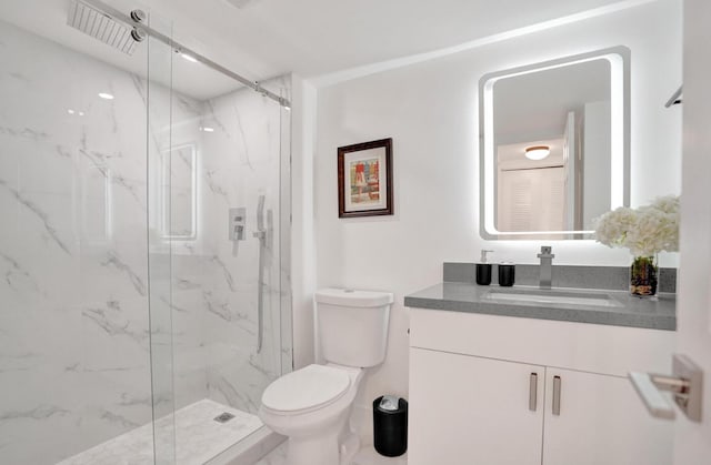 2768 Carambola Cir S Unit 301, Coconut Creek, FL 33066 - full bath with vanity, toilet, and a marble finish shower