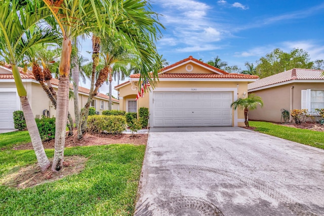 9640 Cherry Blossom Ct, Boynton Beach, FL 33437 - view of front of property featuring stucco siding, concrete driveway, a tile roof, and an attached garage