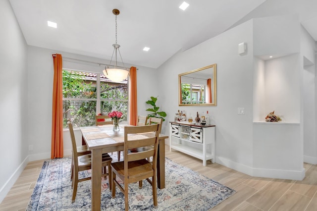 9640 Cherry Blossom Ct, Boynton Beach, FL 33437 - dining space with vaulted ceiling, baseboards, and light wood-type flooring