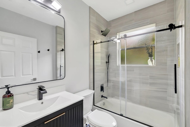 9640 Cherry Blossom Ct, Boynton Beach, FL 33437 - full bath with combined bath / shower with glass door, toilet, and vanity