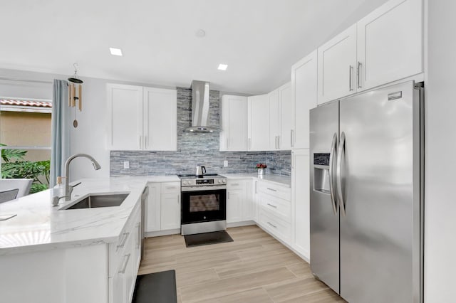 9640 Cherry Blossom Ct, Boynton Beach, FL 33437 - kitchen featuring appliances with stainless steel finishes, wall chimney exhaust hood, a sink, light stone counters, and tasteful backsplash